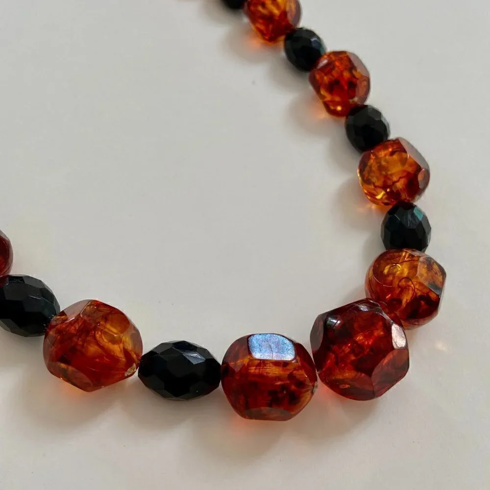 Orange and black beaded necklace